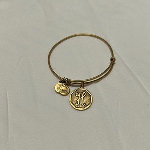 Alex and Ani gold ‘H’ bracelet.